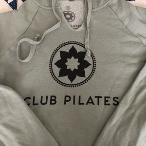 Adorable cropped club pilates hooded sweatshirt.